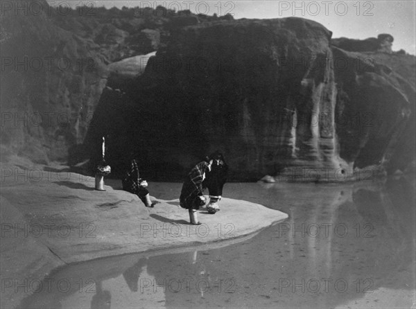 Acoma water carriers, c1905. Creator: Edward Sheriff Curtis.