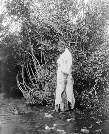 At the water's edge-Arikara, c1908. Creator: Edward Sheriff Curtis.