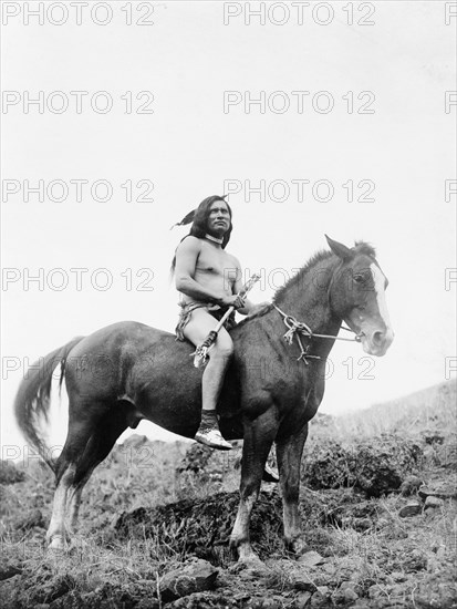 The old-time warrior-Nez Percé, c1910. Creator: Edward Sheriff Curtis.
