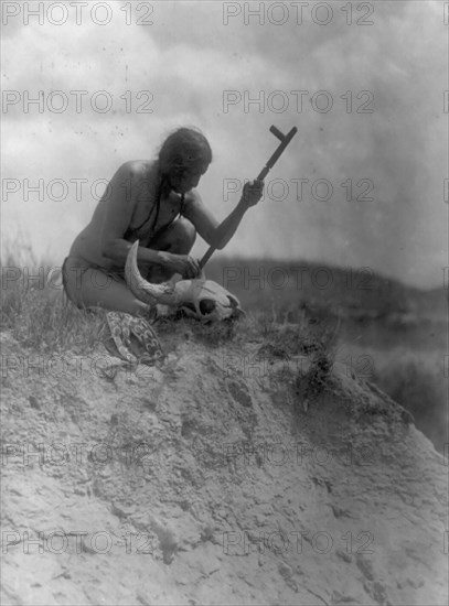 The offering-Hu Kalowa Pi ceremony, 1907, c1907. Creator: Edward Sheriff Curtis.