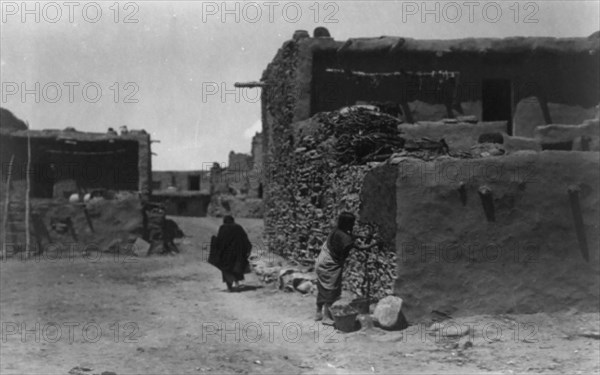 Hopi house builder, c1905. Creator: Edward Sheriff Curtis.