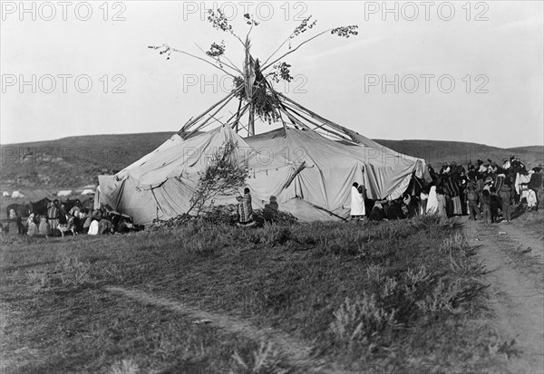 Sun dance in progress-Cheyenne, c1910. Creator: Edward Sheriff Curtis.