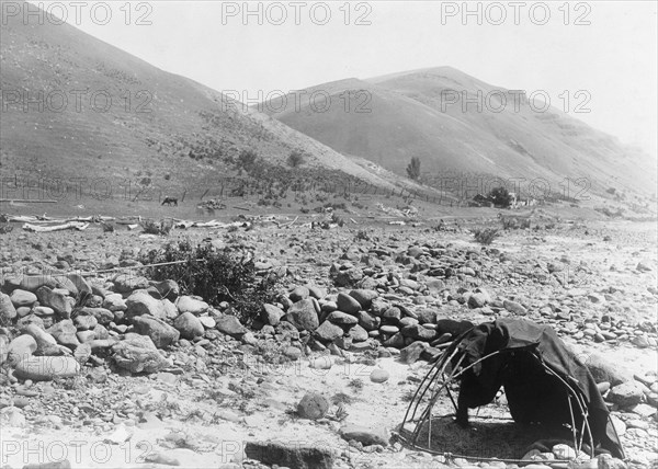 Nez Percé sweat-lodge, c1910. Creator: Edward Sheriff Curtis.