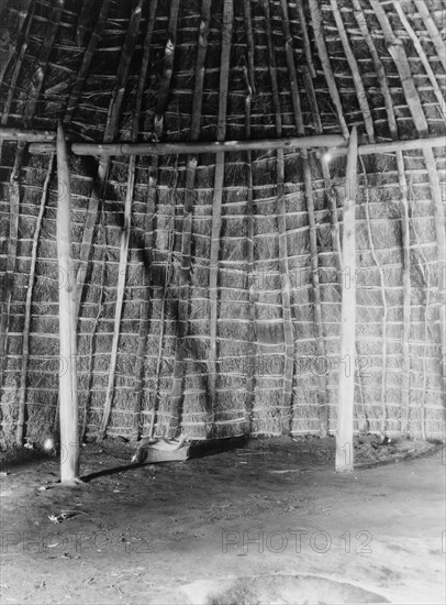 Interior of Wichita grass-house, c1927. Creator: Edward Sheriff Curtis.