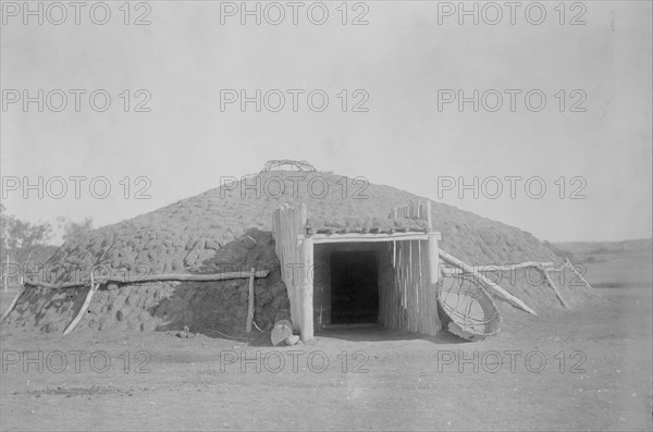 Mandan earthen lodge, c1908. Creator: Edward Sheriff Curtis.