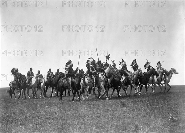 Brulé war party, c1907. Creator: Edward Sheriff Curtis.