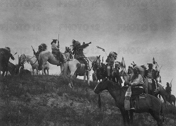 Planning a raid, c1907. Creator: Edward Sheriff Curtis.