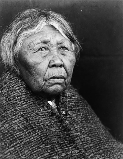 Hleastunuh-Skokomish, Indian women, head-and-shoulders portrait, facing right, c1913. Creator: Edward Sheriff Curtis.