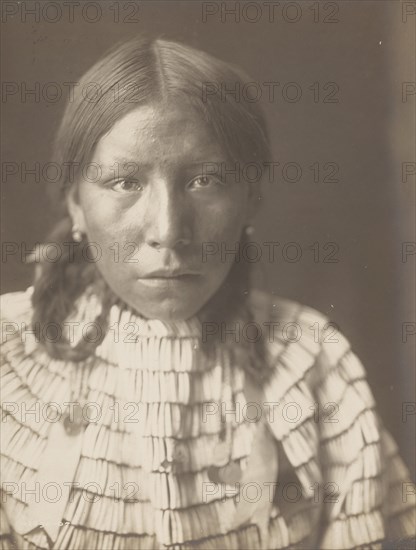 Big Road's daughter, 1907. Creator: Edward Sheriff Curtis.