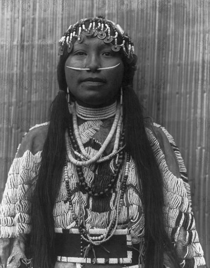 Wishham (i.e., Wishram) girl, c1910. Creator: Edward Sheriff Curtis.