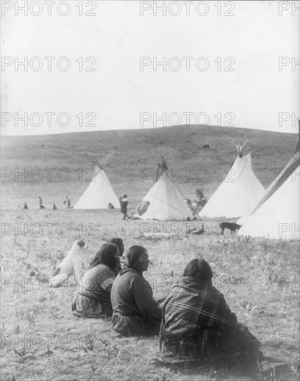 Camp gossips-Atsina, c1908. Creator: Edward Sheriff Curtis.