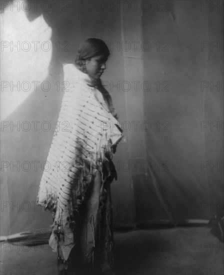 Atsina maiden, c1908. Creator: Edward Sheriff Curtis.