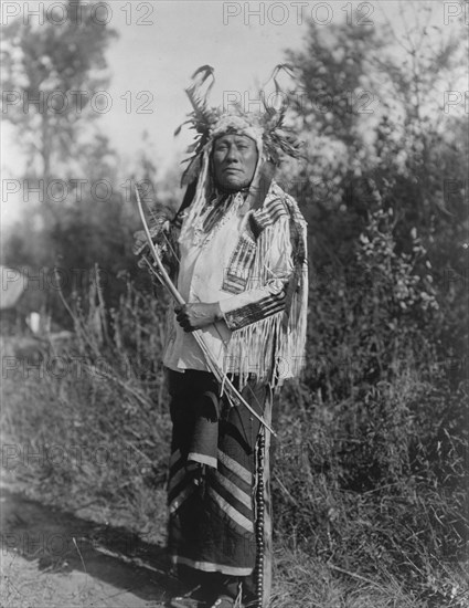 Long Time Dog-Hidatsa, c1908. Creator: Edward Sheriff Curtis.