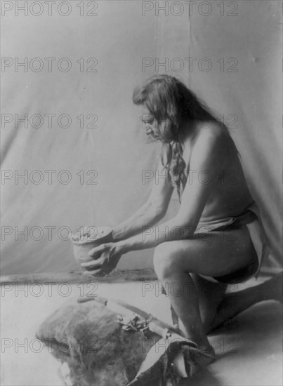 Incense over a medicine bundle, c1908. Creator: Edward Sheriff Curtis.