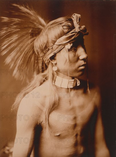 Shows As He Goes, half-length portrait, c1905. Creator: Edward Sheriff Curtis.