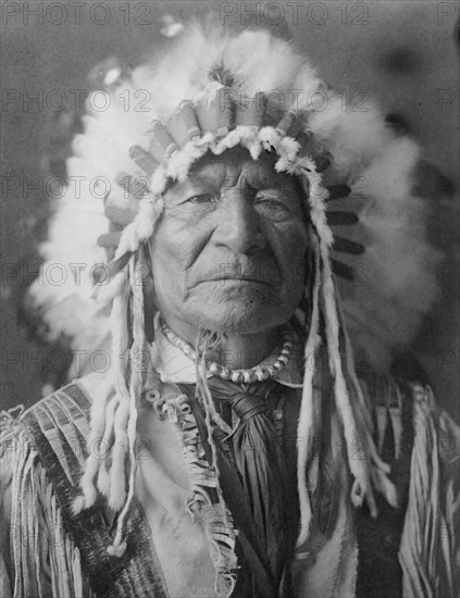 Sitting Bear-Arikara, c1908. Creator: Edward Sheriff Curtis.