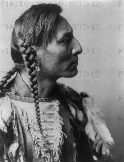 Spotted Bull-Mandan, c1908. Creator: Edward Sheriff Curtis.