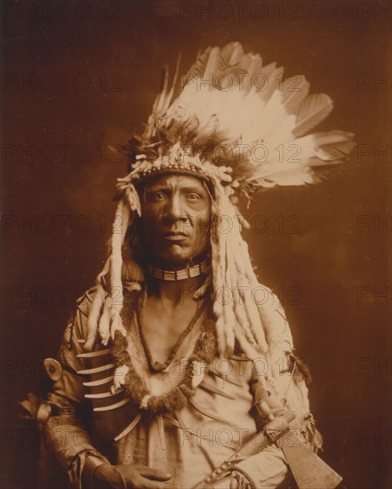 Weasel Tail-Piegan, c1900. Creator: Edward Sheriff Curtis.