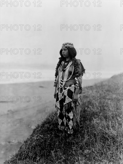 On the shores of the Pacific-Tolowa, c1923. Creator: Edward Sheriff Curtis.