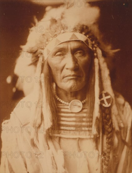 Young Hairy Wolf-Apsaroke, c1905. Creator: Edward Sheriff Curtis.