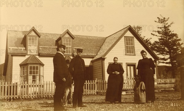 Unidentified group of people, three men, two women, a child and a dog standing in front..., 1894 &95 Creator: Alfred Lee Broadbent.