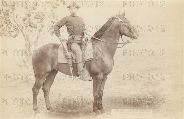 The Cavalier The young soldier and his horse on duty [a]t camp Cheyenne [] /, 1890. Creator: John C. H. Grabill.