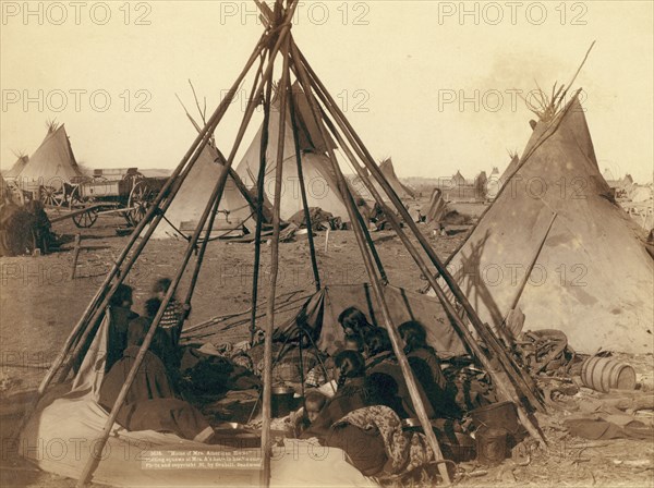 Home of Mrs American Horse Visiting squaws at Mrs A's home in hostile camp, 1891. Creator: John C. H. Grabill.