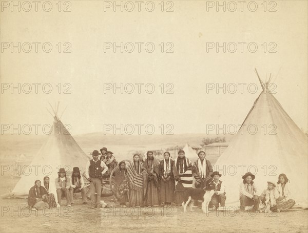 The Indian Girl's Home A group of Indian girls and Indian police at Big Foot's village..., 1890. Creator: John C. H. Grabill.