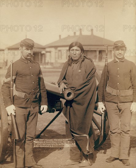 Tasunka, Ota (alias Plenty Horse[s]), the slayer of Lieut Casey, near Pine Ridge, SD, 1891. Creator: John C. H. Grabill.