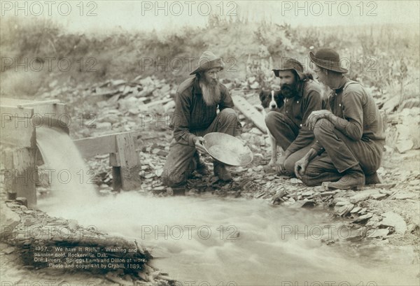 We have it rich Washing and panning gold, Rockerville, Dak Old timers, Spriggs, Lamb..., 1889. Creator: John C. H. Grabill.