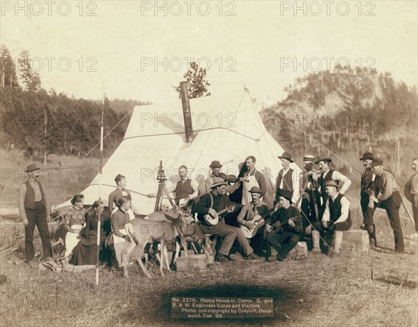 Happy Hours in Camp G and B&M Engineers Corps and Visitors, 1889. Creator: John C. H. Grabill.