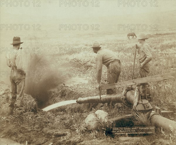 A Golden work Hydroulic [sic] mining at Rockdrville [ie Rockerville], Dak, 1889. Creator: John C. H. Grabill.