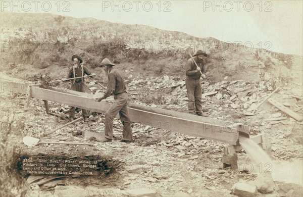 Gold Dust Placer mining at Rockerville, Dak Old timers, Spriggs, Lamb and Dillon at work, 1889. Creator: John C. H. Grabill.