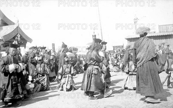 A group of Buddhist monks in the datsan, 1880.  Creator: Nikolai Nikolaevich Petrov.