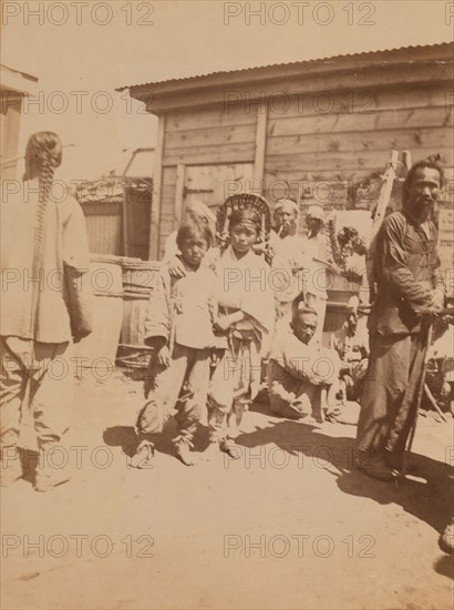 Korean children, Chinese men, and others at the farmers' market, Vladivostok, Russia, 1899. Creator: Eleanor Lord Pray.