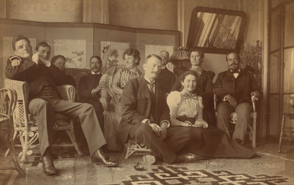 A social gathering in the veranda room, Dom Smith, Vladivostok, Russia, 1899. Creator: Frederick S. Pray.