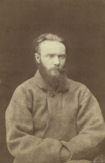 Shchedrin, one of four men chained to wheelbarrows at Kara, between 1880 and 1886. Creator: Unknown.