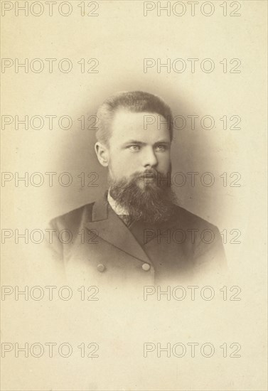 K Mikhailov, head-and-shoulders portrait, facing slightly right, between 1880 and 1886. Creator: Unknown.