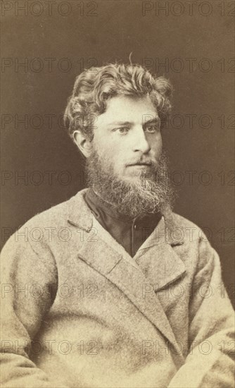 Half-length portrait of a man, dressed in convict clothing, facing right, between 1880 and 1886. Creator: Unknown.