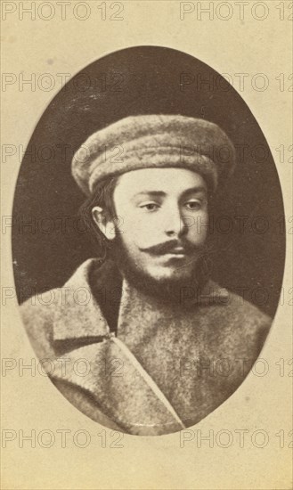 Head-and-shoulders portrait of a man, dressed in convict clothing, facing..., between 1880 and 1886. Creator: Unknown.