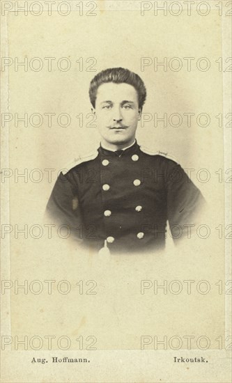 Telegraph operator in Irkutsk, head-and-shoulders portrait, facing front, between 1880 and 1886. Creator: Unknown.