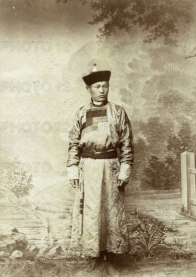 Buryat in national festive costume, 1895-1939. Creator: L Veniukov.
