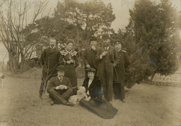 Russian Minister Pavlov and Mrs. Pavlov on Legation grounds at Seoul, c1904. Creator: Robert Lee Dunn.