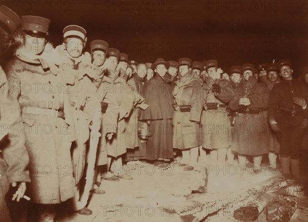 Flashlight - Jap soldiers at Chemulpo, after naval battle, standing around bonfire, c1904. Creator: Robert Lee Dunn.