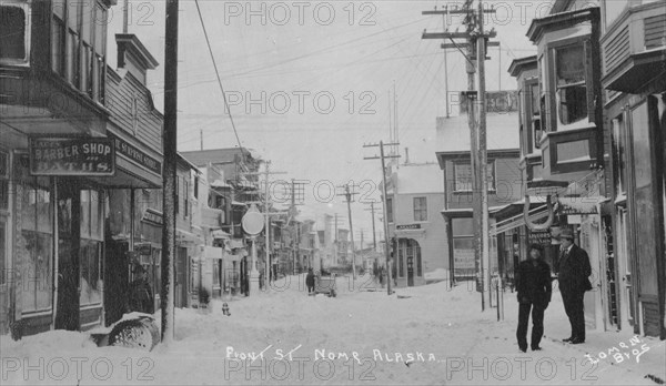 Front Street covered with snow, between c1900 and c1930. Creator: Lomen Brothers.