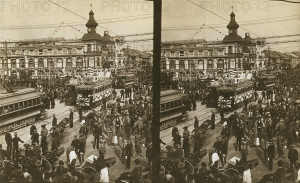 Crowds on a Tokyo street, near the train station(?), during the celebration of Admiral..., c1905. Creator: Underwood & Underwood.