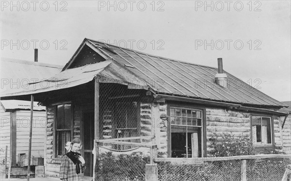 Log cabin, between c1900 and 1916. Creator: Unknown.