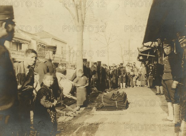 Distribution of blankets to troops at Tokio, c1904. Creator: Unknown.