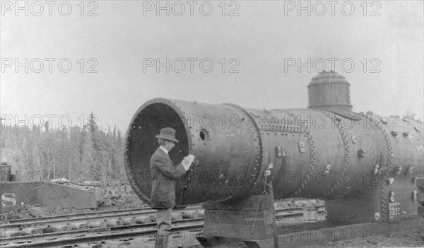 Frank G. Carpenter inspecting new railroad, between c1900 and 1916. Creator: Unknown.