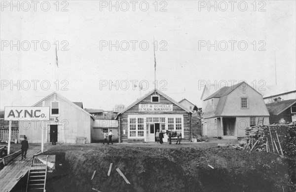 Scene in front of Ott and Scheele's general merchandise store, between c1900 and 1916. Creator: Unknown.